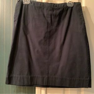 Navy blue, 100% cotton, skirt perfect for a preppy look, or even a uniform.